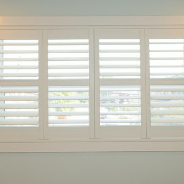 White Interior Window Shutters with Wide Trim | The Junction