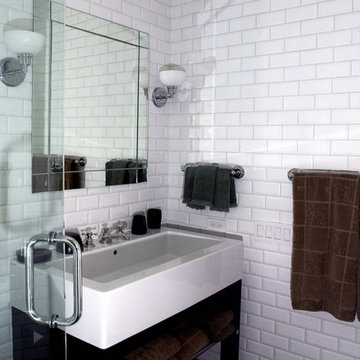 Guest Bath features Floor to Ceiling White Subway Tile and Open Shelf Vanity