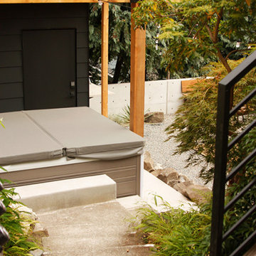 Path from deck to hot tub patio and backyard