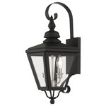 Livex Lighting - Adams 2-Light Black Outdoor Medium Wall Lantern, Brushed Nickel Cluster - The stylish black finish outdoor Adams wall lantern is a great way to update your home's exterior decor. A flat metal curved arm attaches the solid brass decorative housing to the square backplate while clear glass shows off the brushed nickel finish cluster.