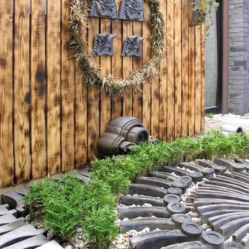 鬼面のある「古瓦・枯山水庭園」:古瓦のReuse(リユース)坪庭庭園