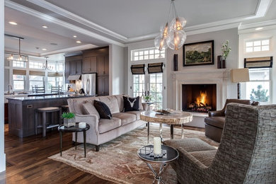 Mid-sized transitional formal open concept living room in Denver with grey walls, dark hardwood floors, a standard fireplace, a wall-mounted tv and brown floor.