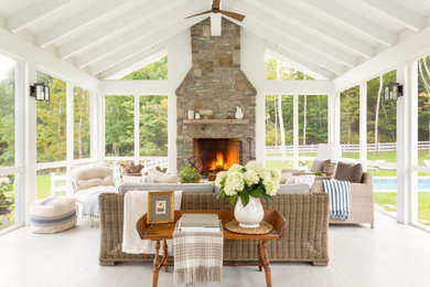 Cottage screened-in porch photo in New York with decking and a roof extension