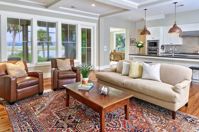 Living room - mid-sized transitional formal and open concept medium tone wood floor living room idea in Atlanta with gray walls and no fireplace
