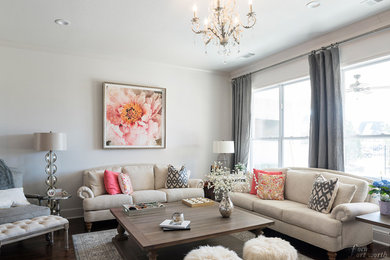 Example of a mid-sized eclectic open concept dark wood floor living room design in Dallas with white walls, a standard fireplace, a wood fireplace surround and a wall-mounted tv