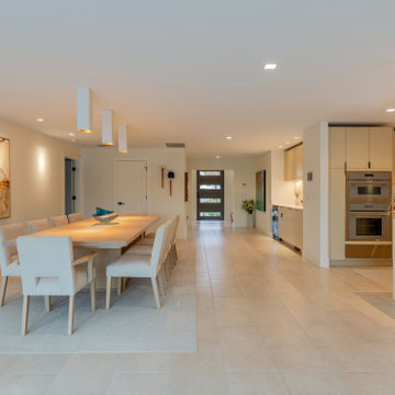 Linear dining layout with integrated transitional flow and neutral material pale
