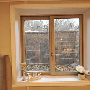 Photo of a basement in Cleveland with carpet and beige floors.