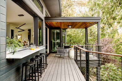 This is an example of a contemporary terrace in Other with a bar area.