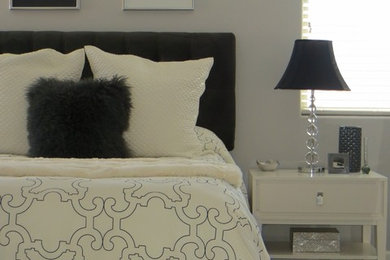 Example of a mid-sized trendy master carpeted bedroom design in Phoenix with gray walls