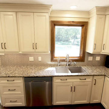 Cream Kitchen with Green Island with Butcher Block Countertop