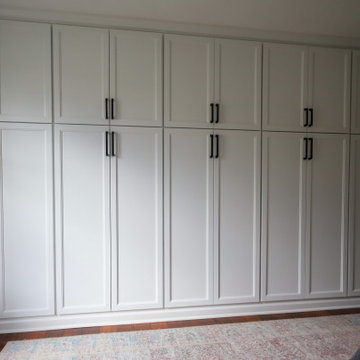 Floor-to-Ceiling Built-In Cabinetry Wall