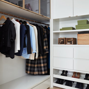 White & Gold Walk-In Closet with Roll Out Shoe Storage