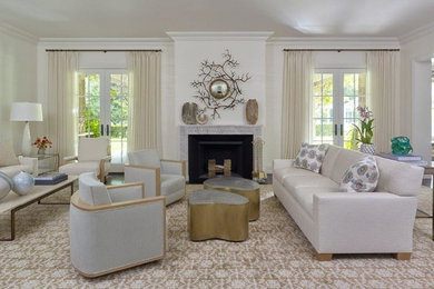 Large transitional enclosed living room photo in New York with beige walls, a standard fireplace, a stone fireplace and no tv