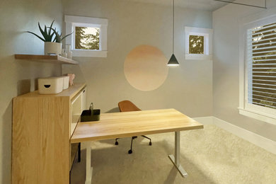 Example of a minimalist home office design in Seattle
