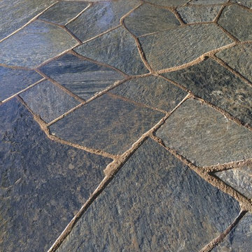 Chocolate Charcoal Quartzite Flagstone Patio with Basalt Column Fountain