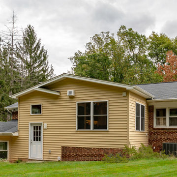 Cheerful Multi Level Rear Addition to Expand Kitchen, Mudroom & Sunroom in Oakt