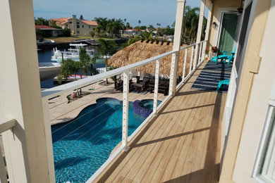 Inspiration for a contemporary cable railing balcony remodel in Tampa