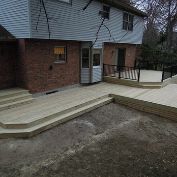 Treated Lumber patio deck with Aluminum railing and wood skirting, Loveland OH