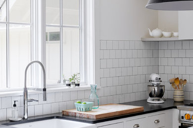 Farmhouse kitchen photo in Austin