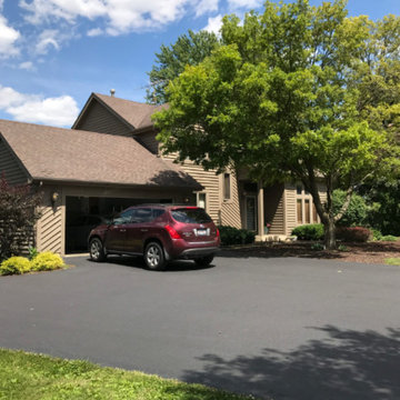 Oswego Home Receives Stone Wainscoting and New Siding