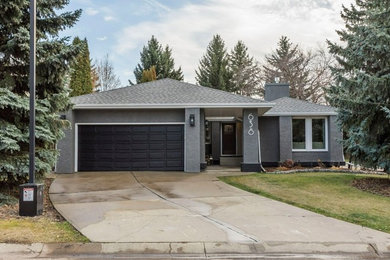 Example of a transitional exterior home design in Edmonton