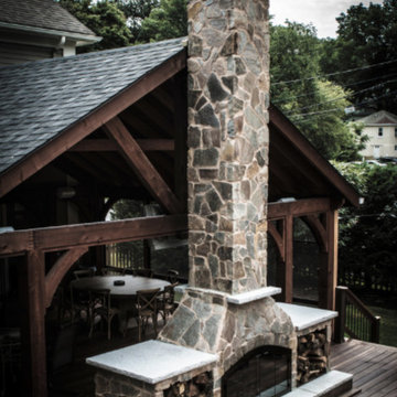 Double Sided Outdoor Fireplace with Deck and Pavilion