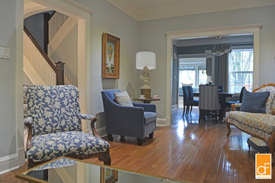 Example of a small classic formal and enclosed dark wood floor living room design in Toronto with blue walls and a standard fireplace