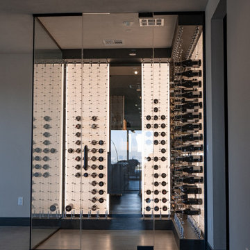 Ultra Modern Wine Cellar With Single-Glazed Glass Panels
