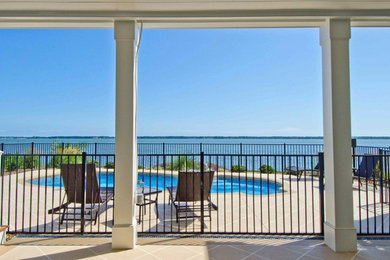 Beach style pool photo in Other