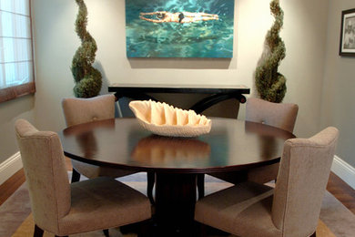Photo of a contemporary dining room in Dallas with grey walls and dark hardwood floors.
