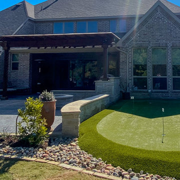 The Ultimate Golfer’s Retreat: Custom Putting Green & Entertainment Oasis
