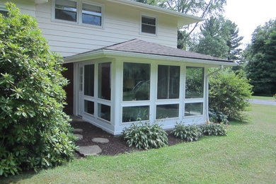 Sunroom - traditional sunroom idea in Cleveland