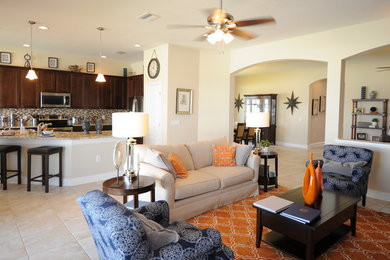 This is an example of a contemporary living room in Tampa with beige walls and ceramic floors.