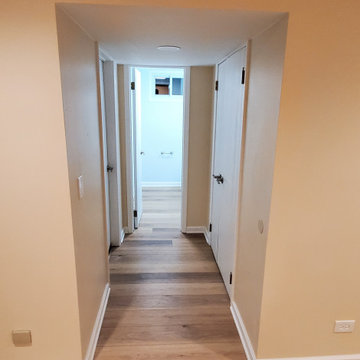Finished basement reconfigured hallway.