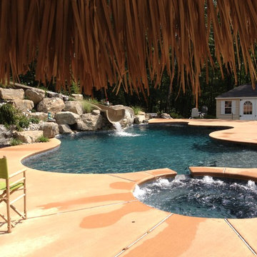 Stroud Township salt water pool with spa, sunshelf, slide, and waterfall