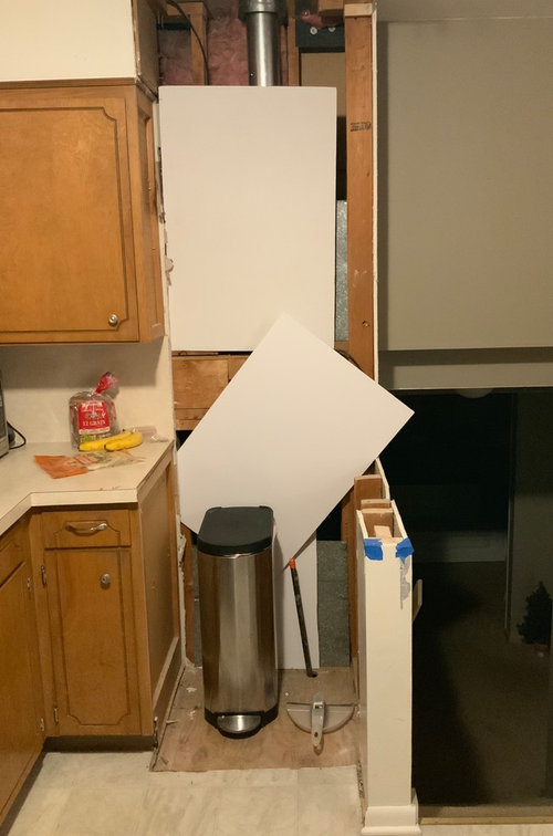 Can an oven go next to a long knee wall?