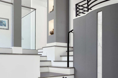 Large minimalist wooden metal railing staircase photo in San Francisco