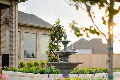 Inspiration for a french country landscaping in Houston.