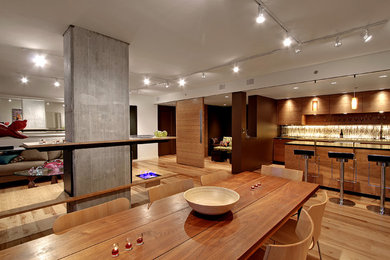 Great room - contemporary medium tone wood floor great room idea in Seattle