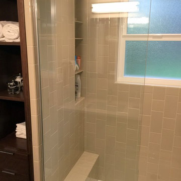 Vertical two size subway tile walk in shower