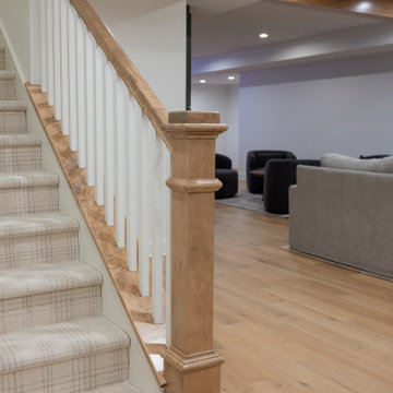 Modern Cozy Basement Remodel with Kings Buff Oak Flooring