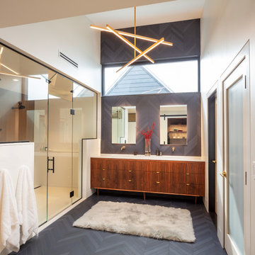 Modern Bathroom with Glass Door Shower, Dual Vanity and Two Private Toilet Rooms