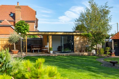 Design ideas for a medium sized modern back garden in Sussex.