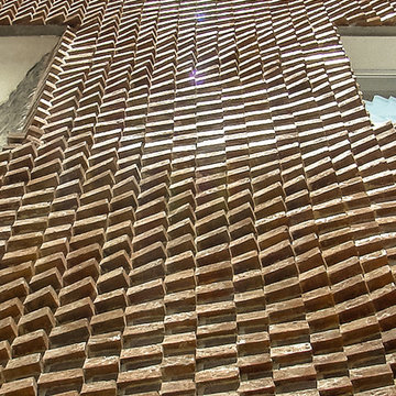 AN ON-SITE TECHNIQUE FOR PARAMETRIC BRICK WALLS WITH ROTATING BRICKS//ßtudiomm16