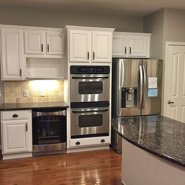 Cabinets Refinished from Cherry to White