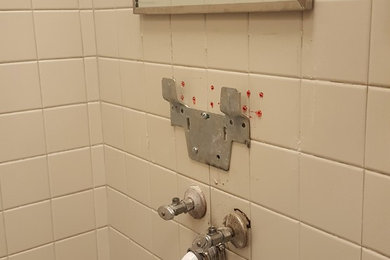 Bathroom - industrial bathroom idea in Orlando