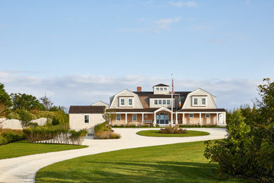 Coastal wood and shingle house exterior idea in Boston with a shingle roof and a gambrel roof