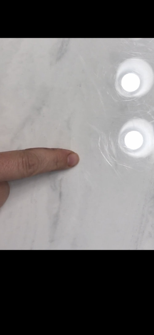 Scratches on cultured marble?