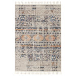 Jaipur Living - Vibe by Jaipur Living Camili Tribal Blue and Light Orange Area Rug, 6'7"x9'6" - The Bahia collection lends a global vibe to any space with a modern twist on classic Moroccan motifs. The Camili rug features a distressed tribal design in an updated colorway of blue, light orange, black, ivory, gray, and brown. Soft to the touch, this medium plush rug emulates the inviting and worldly style of authentic flokati rugs, but in a durable polypropylene power-loomed quality. Braided fringe accents further the boho-chic appeal of this unique rug.