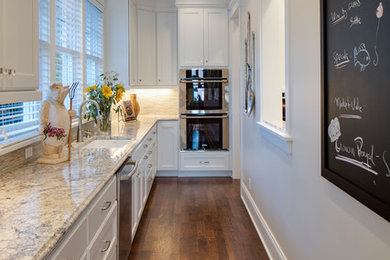Photo of a transitional kitchen pantry in Minneapolis.